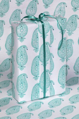 Wrapping paper white/turquoise paisley motif is eco friendly & sustainable.