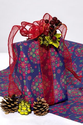 Wrapping paper navy tree and bauble is classy, traditional and eco friendly.