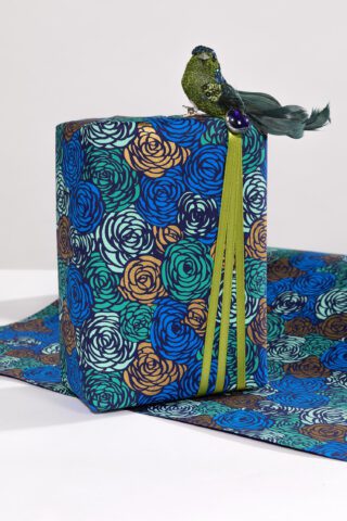 Wrapping paper blue roses is a delightful print available in rich colours.