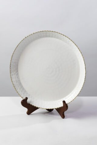 This white enamel platter with a beaded edge is the essence of fine dinning