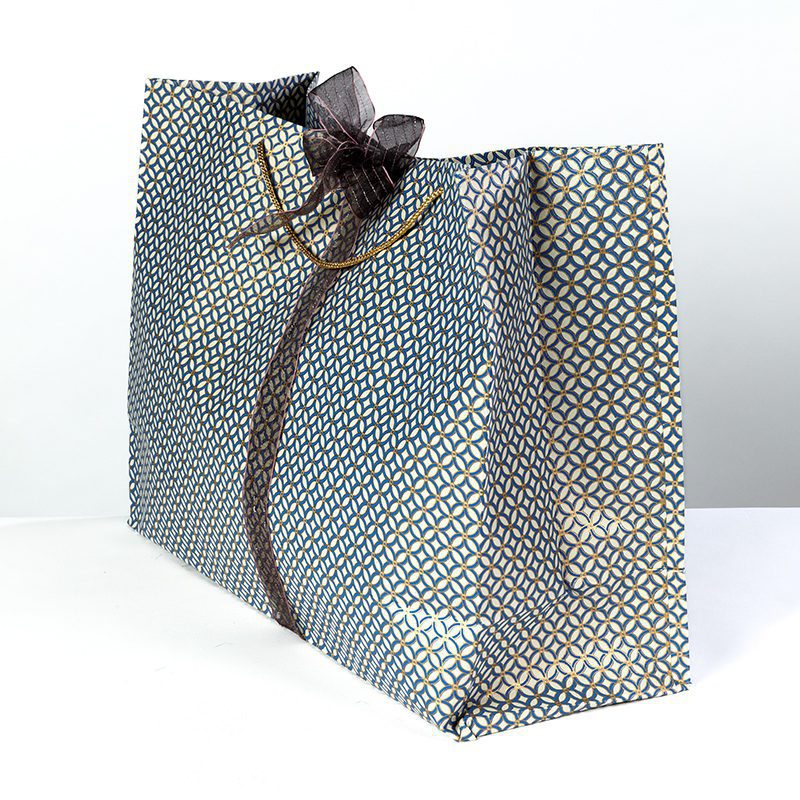 Blue trellis print jumbo gift bags with a contemporary design printed in rich colours of blue and gold are perfect for Christmas and an excellent design for men's gift bags.
