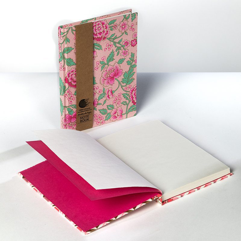 Peony notebook features enchanting peony blooms on pink paper.