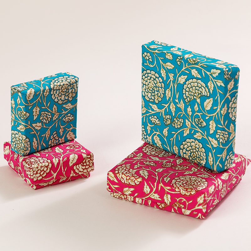 Handmade Jaipur floral gift boxes are crafted from cotton paper.