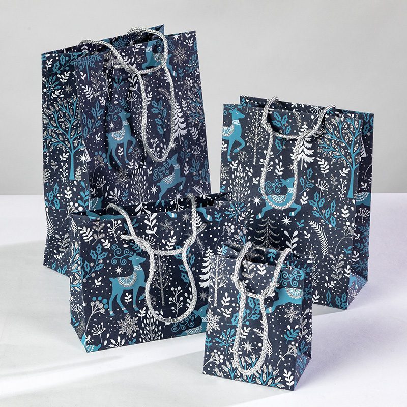 Blue Enchanted Forest Christmas gift bags are handmade & elegant.
