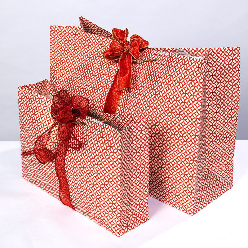 Trellis Print bags feature a timeless lattice design red & gold.